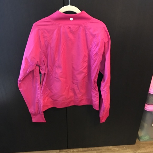 Pink reversible light jacket - Picture 2 of 3